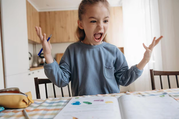 Child displaying emotional outburst and hyperactivity during study time indicating behavioral concerns